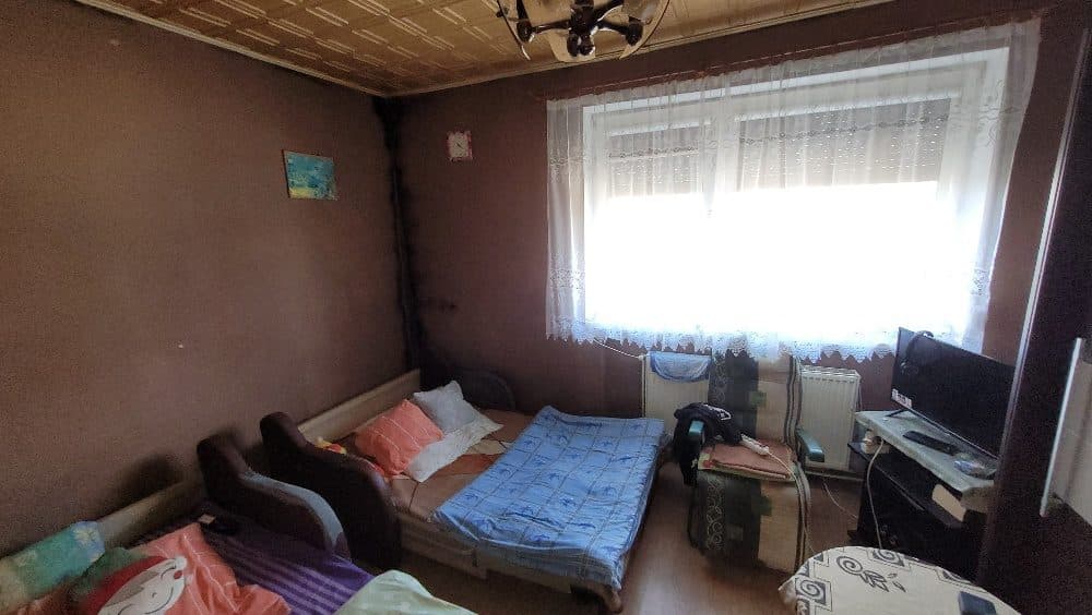 Lokal mieszkalny w domu jednorodzinnym, dwulokalowym, z pom. gospodarczym i garażowym, na działce 1069m2 – zdjęcie 5 z 12