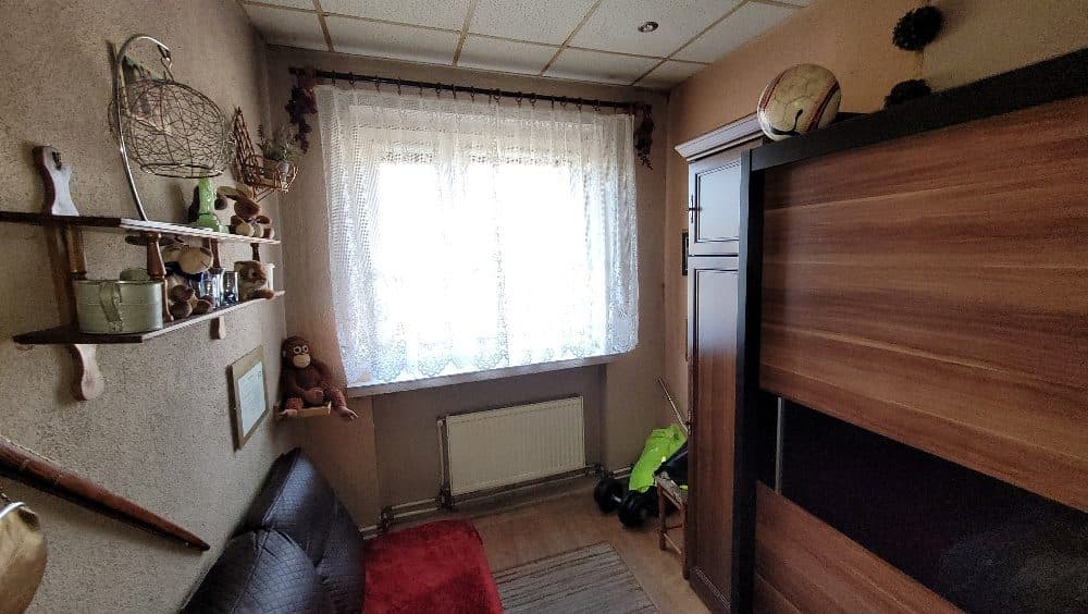 Lokal mieszkalny w domu jednorodzinnym, dwulokalowym, z pom. gospodarczym i garażowym, na działce 1069m2 – zdjęcie 7 z 12