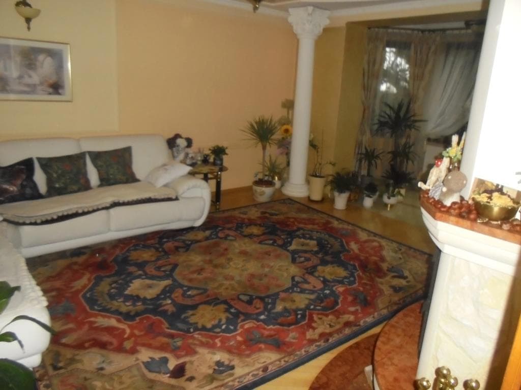 udział dłużniczki wynoszący 99/100 części w nieruchomości oznaczonej jako: działka nr 1824 o pow. 0,0600 ha zabudowana murowanym budynkiem mieszkalnym jednorodzinnym z poddaszem użytkowym oraz wysokim przyziemiem o powierzchni użytkowej 201,90m2, – zdjęcie 6 z 15