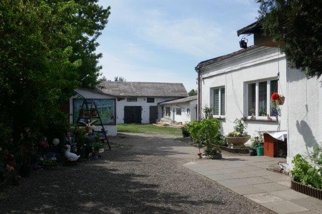 nieruchomość zabudowana o pow. 0,2090 ha