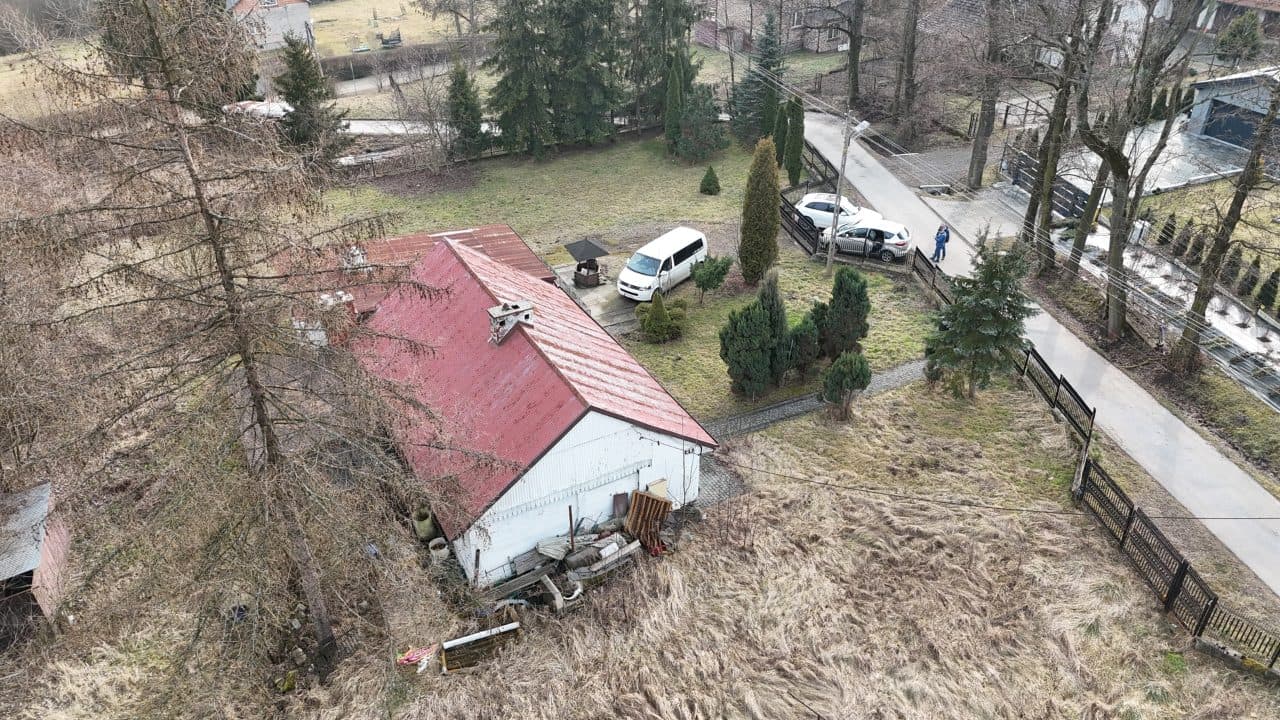 działka nr 164/2 obręb P-96 Kraków,o pow. 0,8365 ha przy ul. Malinowskiego, zabudowana budynkiem mieszkalnym jednorodzinnym nr 25 i przylegającym do niego budynkiem mieszkalnym jednorodzinnym bez nadanego numeru oraz garażem typu blaszak. – zdjęcie 11 z 11