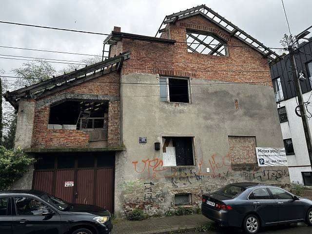 udział 1/2 w prawie własności zabudowanej nieruchomości gruntowej - działki nr 407, o powierzchni 0,0497 ha, położonej w Krakowie przy ul. Przybyszewskiego 40, dla której SR dla Krakowa-Podgórza w Krakowie IV WKW prowadzi KW nr KR1P/00018149/0. – zdjęcie 5 z 9