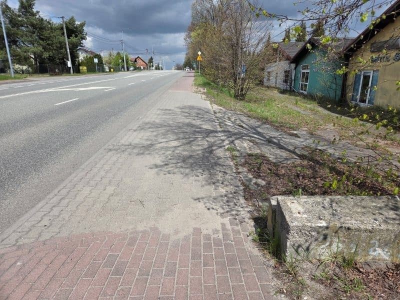 Dwa lokale mieszkalne wraz z udziałem we wspólnej nieruchomości gruntowej położonej w Rybniku przy ul. Gliwickiej 210-212 – zdjęcie 2 z 34