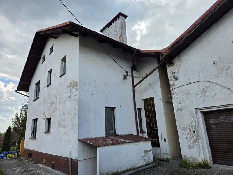 Dwa lokale mieszkalne wraz z udziałem we wspólnej nieruchomości gruntowej położonej w Rybniku przy ul. Gliwickiej 210-212 – zdjęcie 8 z 34