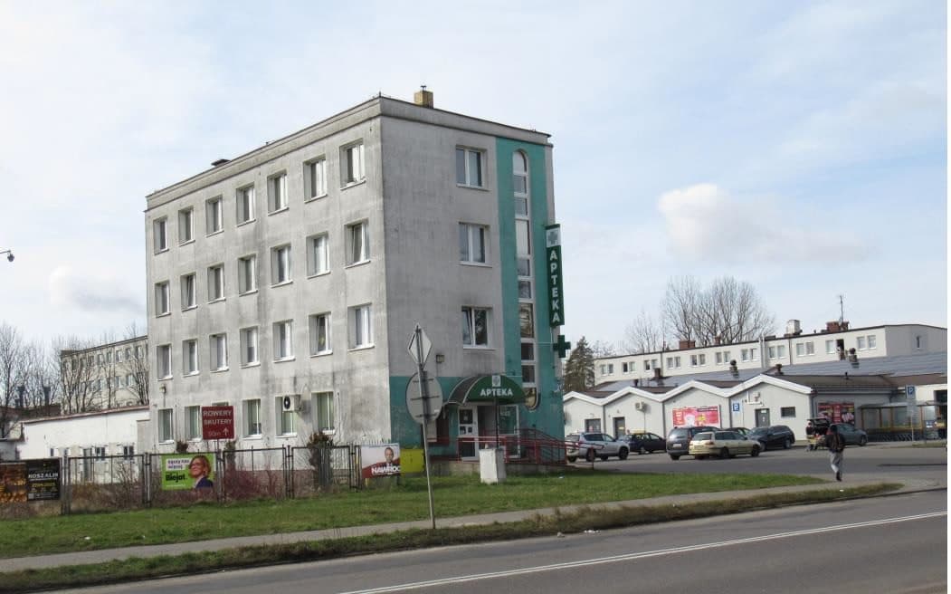 działki gruntu zabudowane budynkami, odrębna nieruchomość