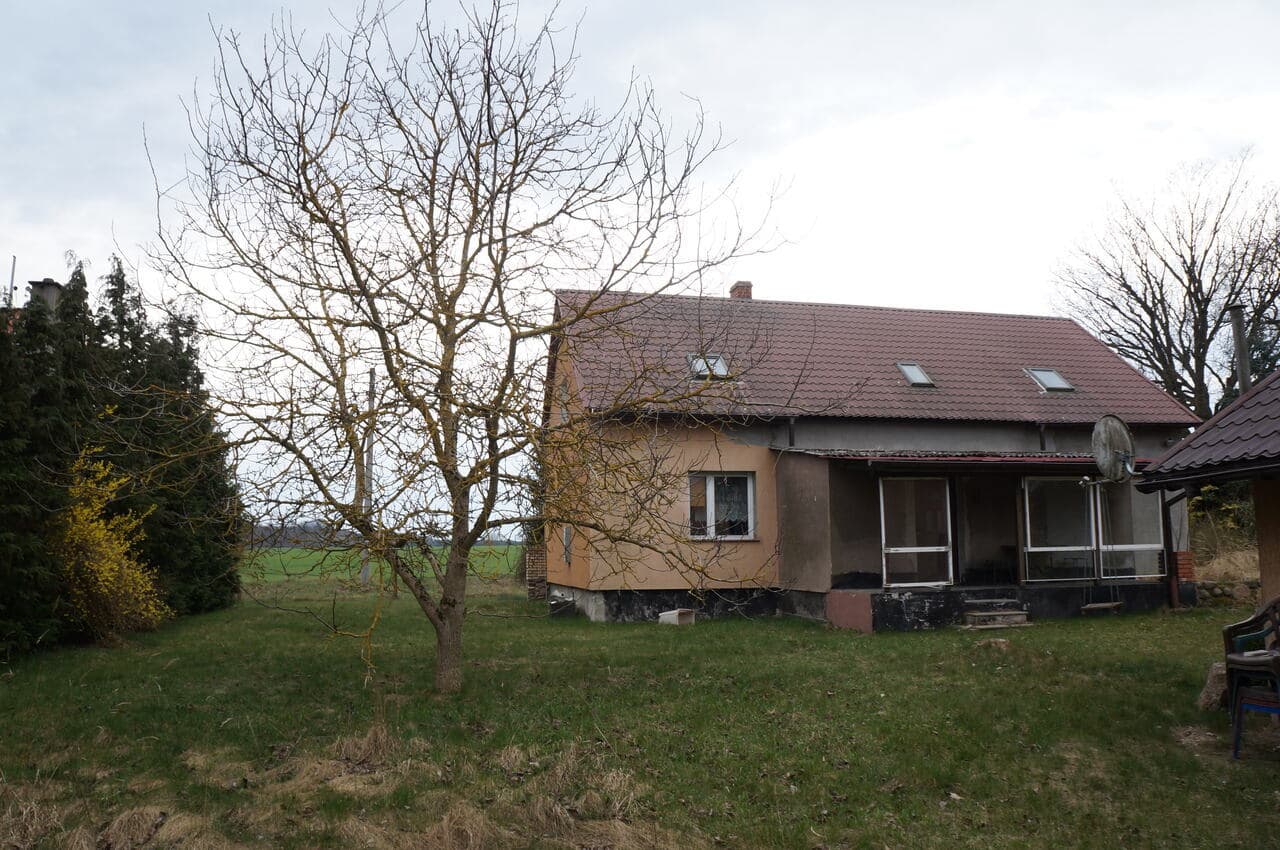 Nieruchomość gruntowa zabudowana budynkiem mieszkalnym oraz budynkiem gospodarczym – zdjęcie 7 z 23