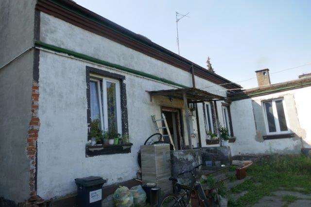 dz. gruntu o nr. ewid. 670, pow. 0,083ha, dom o pow. 110m2, bud. gospod-garażowy