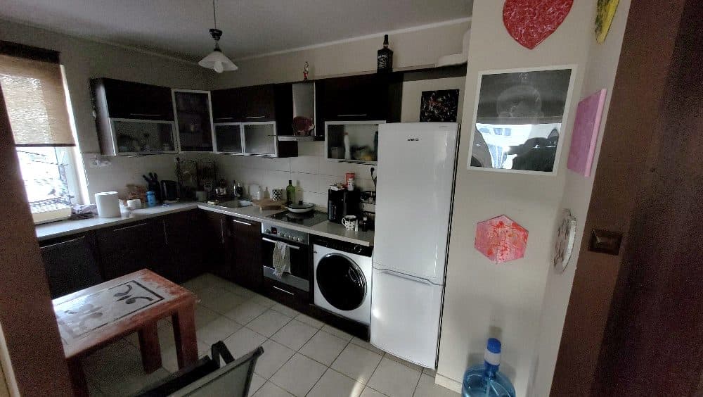 Lokal stanowiący odrębną nieruchomość o pow. 62,1 m2 (46,80 m2 lokal mieszkalny + 15,30 m2 garaż) wraz z udziałem właściciela we współwłasności części wspólnych budynku – zdjęcie 3 z 7
